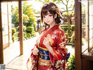 A woman in a blue kimono is posing for a picture.