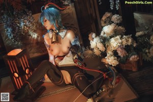 A woman with blue hair holding a bow and arrow.